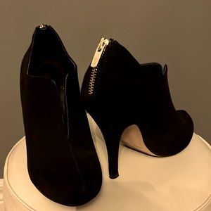 Black suede ankle boot.